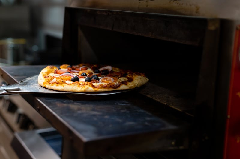 Mod Pizza team members working together