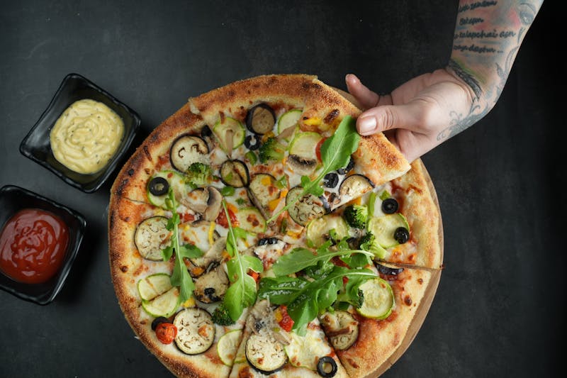 Fresh mod pizza being prepared in our kitchen